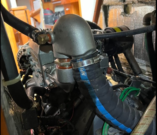 Back in place on the boat. (Second hose clamp also ordered).