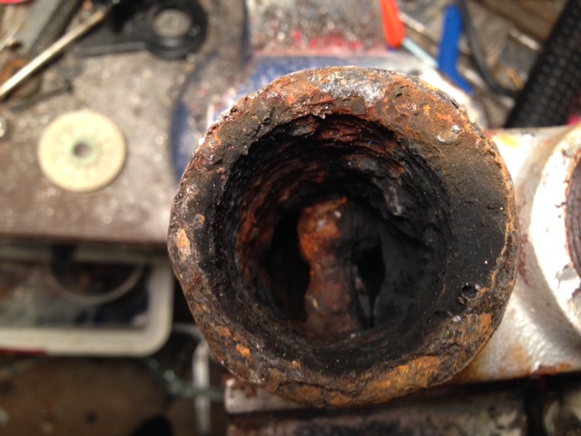 the exhaust channel blocked about 75% with carbon buildup